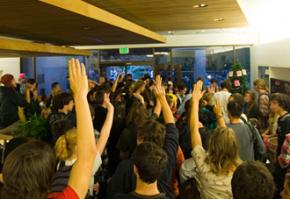 Participants vote at a meeting inside occupied Kerr Hall at the University of California Santa Cruz